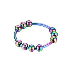 Close-up detail of rainbow iridescent stainless steel spinner ring with ten beads