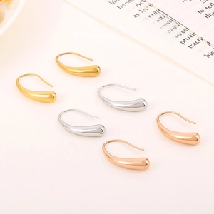 Minimalist stainless steel water drop earrings set in gold, silver, and rose gold finishes