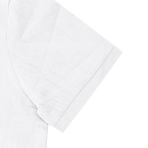 Close-up of short sleeve cuff showing natural linen texture and fine stitching on white polo