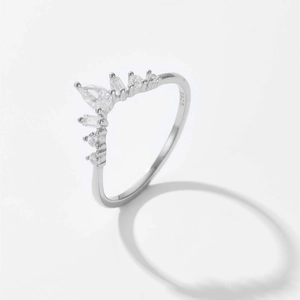 Detailed macro shot of S925 sterling silver crown ring with pear-cut zircon stones