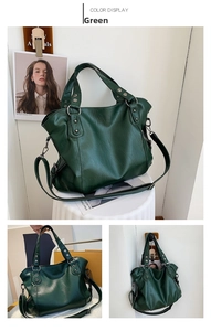 Detail of dark green large tote bag with metallic rivets and adjustable shoulder strap