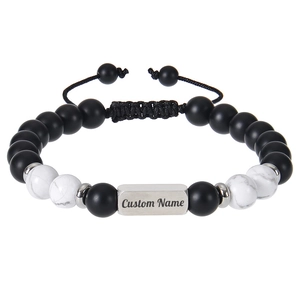 Detail of adjustable beaded bracelet with custom engraved metal plate and stone beads
