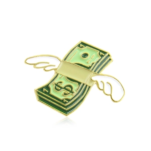 Creative flying dollar enamel pin with white wings and gold-plated alloy detailing