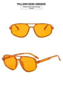 Detail view of double bridge aviator sunglasses with yellow lenses and tortoise frame