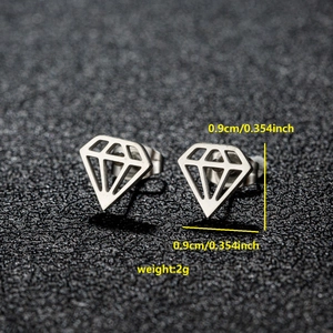 Macro view of geometric diamond shape stainless steel studs measuring 0.9cm wide