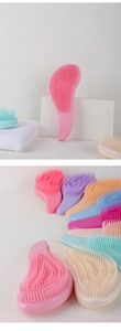 Detail showing colorful flexible bristle hairbrushes for detangling wet and dry hair