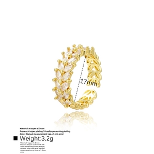 Detail view of wheat ear ring in 18k gold plated copper with marquise cut zircon stones