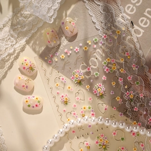 French floral nail stickers with gold stamping, heart and bow designs for spring manicure