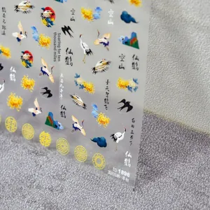 Detailed view of thin adhesive nail stickers with Japanese crane and floral patterns
