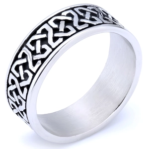 Macro detail of the Viking Celtic knot engraving on a vintage silver steel ring