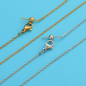 Detail of DIY jewelry making kit with gold and silver bead studs, clasps and chains