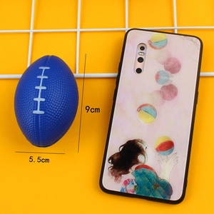 Mini soft PU foam rugby ball in blue and white, 9cm size shown on yellow background