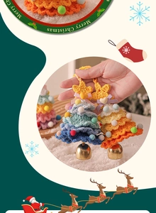 Detail of handmade crochet Christmas tree ornaments with stars and golden bells