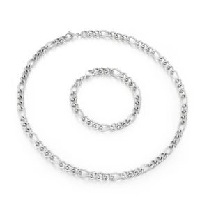 Close-up of silver Figaro chain necklace and bracelet set with frosted textured details
