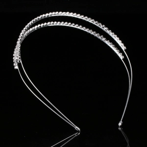 Double-layer silver metal headband with multi-row sparkling rhinestones on black background