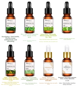 Detail of 8-bottle essential oil set 10ml with dropper brown glass bottles in white background
