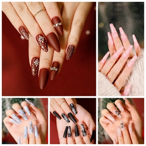 Christmas themed press on nails collection with red matte snowflakes and glitter designs