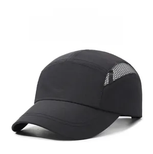 Detail of breathable large mesh panels on a black quick-dry outdoor sports baseball cap