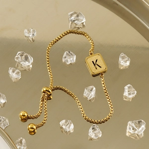 Adjustable 18K gold plated stainless steel bracelet with hollow letter K pendant and crystals