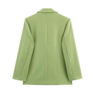 Vue arrière d'un blazer décontracté pour femme en vert herbe sur fond blanc