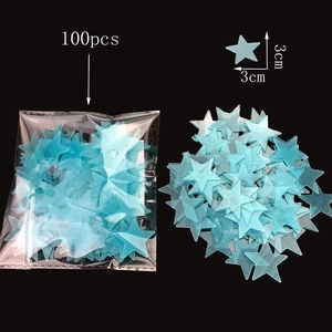 Set of 100 blue glow-in-the-dark star wall stickers sized 3cm for home decor