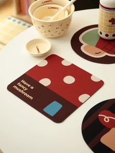 Detail of red mushroom diatomite coaster with Have a fancy mushroom quote and soft texture