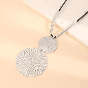 Exaggerated textured double circle pendant necklace with minimalist black rope chain