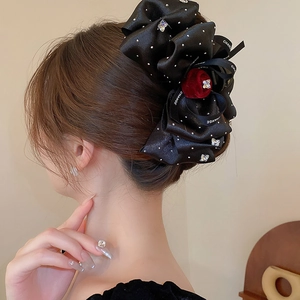 Elegant large black satin hair claw clip with velvet rose and sparkling butterfly accents
