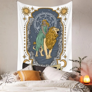 Detail of tarot strength tapestry on bedroom wall with lion and mystical symbols