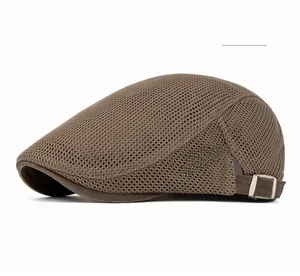 Detail of coffee brown breathable mesh newsboy cap with metal buckle and side logo
