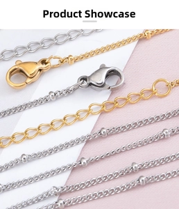 Detail of stainless steel bead chains with lobster clasps in gold and silver finishes