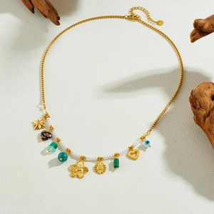 Gold stainless steel necklace featuring star, heart, sunflower and evil eye charms