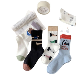 Breathable cotton crew socks with cartoon patterns including giraffes and flowers