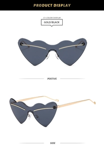 Front and side views of rimless heart-shaped party sunglasses with gold metal temples