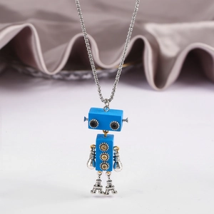 Detail of movable blue robot pendant with silver metal chain and Eiffel Tower legs