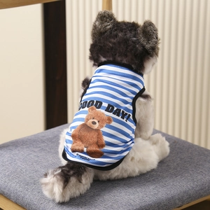 Close-up of blue white striped pet vest with cute bear print and breathable mesh fabric