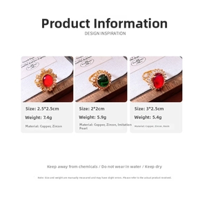 Detailed view of three vintage 24k gold-plated rings with pearls and colorful gemstones