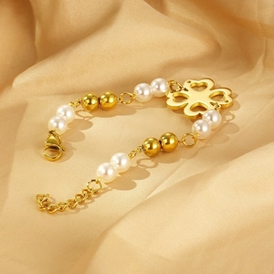 Elegant gold titanium steel clover bracelet with white pearls and heart hollow charms