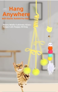 Hanging interactive cat toy with elastic cord, tinkling bell ball and white feathers