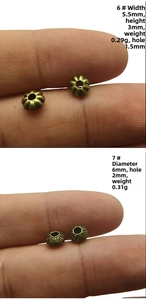 Macro detail of antique bronze alloy spacer beads for DIY jewelry with size dimensions