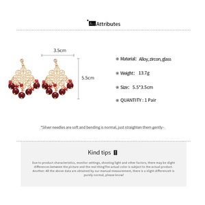 Detailed size chart showing gold filigree earrings with red beads and zircon accents
