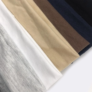 Detailed view of layered cotton sports headbands showing soft texture and color options
