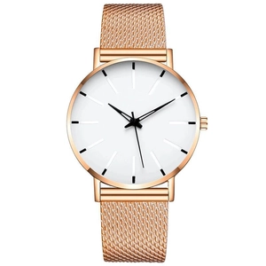Close-up of rose gold Milanese mesh strap and white dial with metal indices