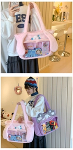 Detail of plush tote bag with clear PVC window for anime accessory display