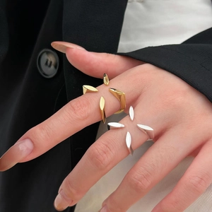 Modern 925 sterling silver leaf design ring in polished gold and silver finishes