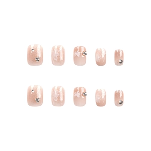 Short square press-on nails featuring white floral patterns and silver glitter gradient