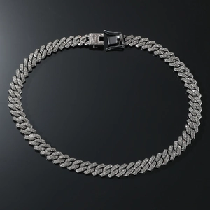 Macro shot of silver hip-hop cuban link necklace with shining double-row diamonds