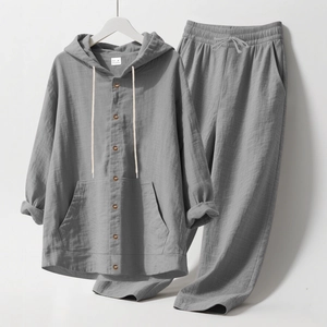 Detailed texture of grey linen hooded shirt and pants set with size M label shown