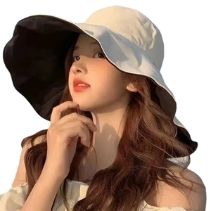 Women wide brim sun hat in beige and black, reversible double-sided fisherman cap design