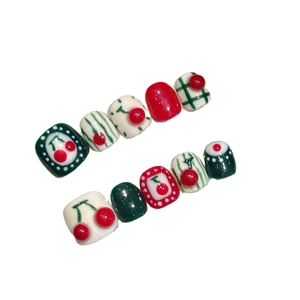 Handmade cute cherry press-on toe nails for girls featuring red and green retro patterns